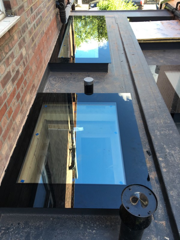 Multiple flat roof skylights on extension in Golders Green